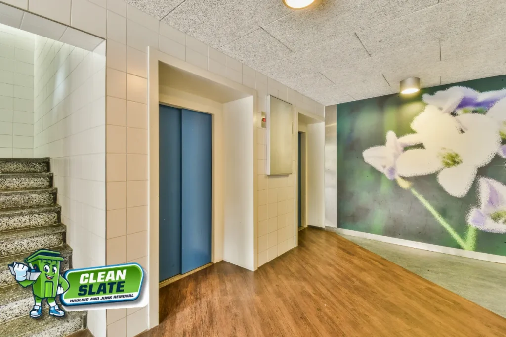 Apartment building hallway and elevator during appliance removal