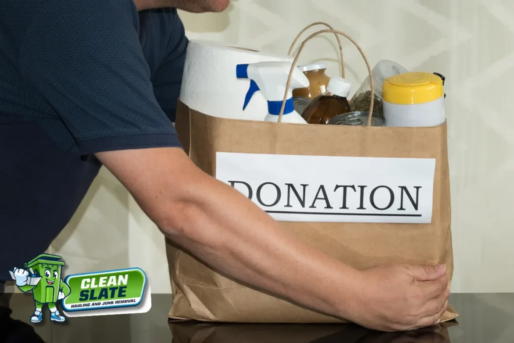 Person carrying a donation bag during an estate cleanout in Tacoma